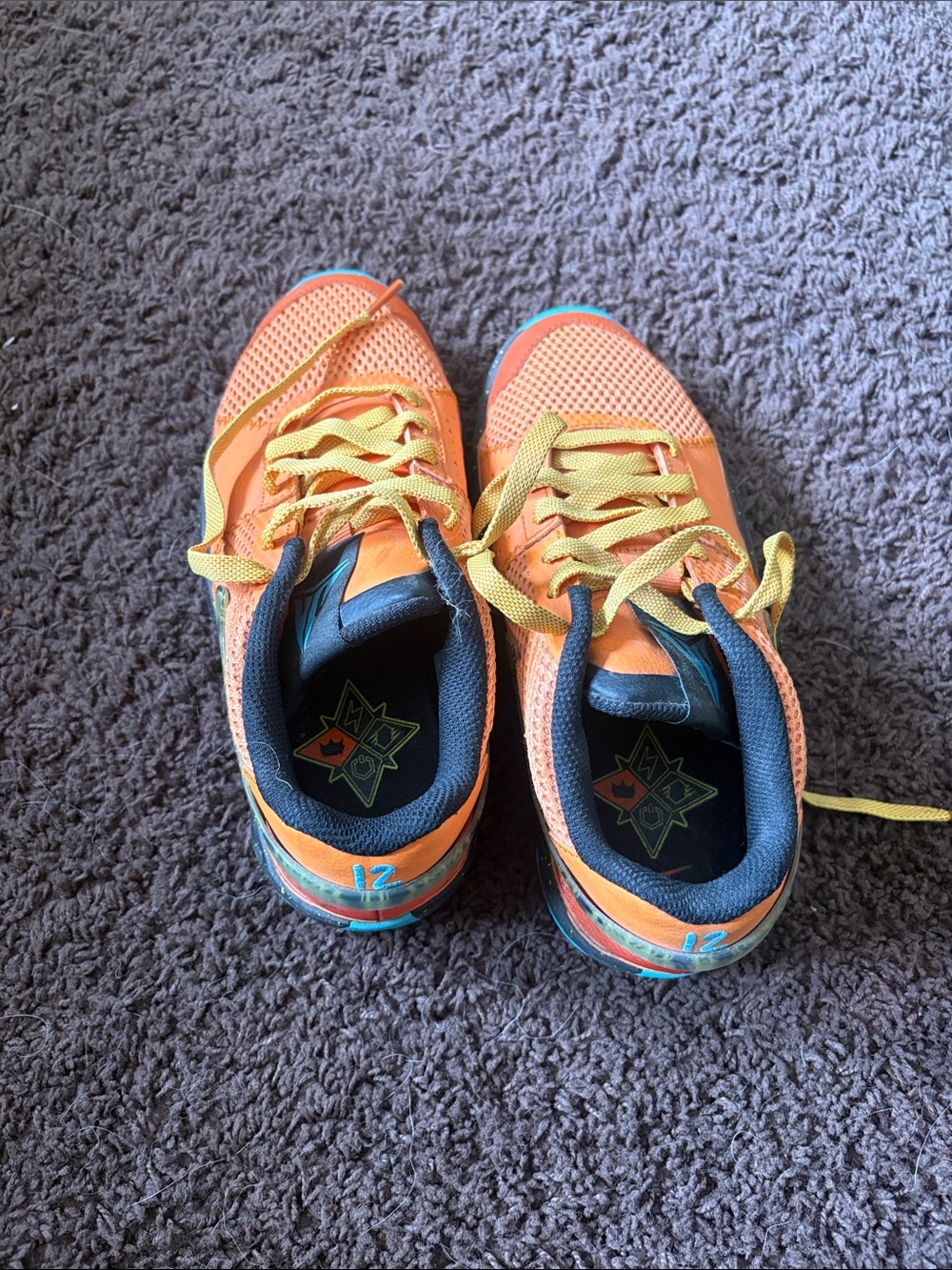 Nike Kids Orange and Yellow Sneakers with Blue Accents